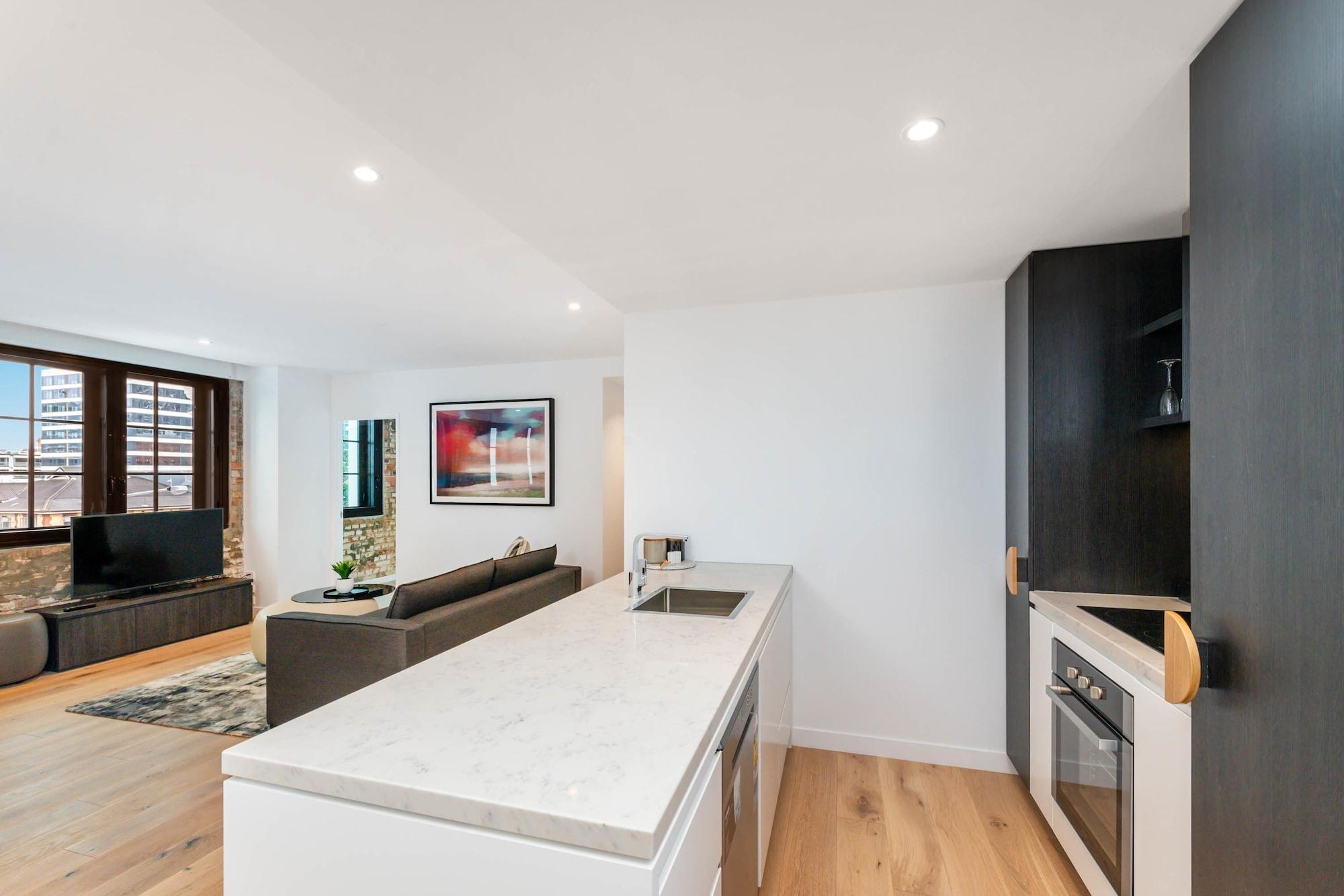 Aparthotel Fv By Peppers Brisbane Exterior foto The kitchen and living area of a typical apartment
